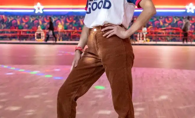 standing woman using roller skates inside building